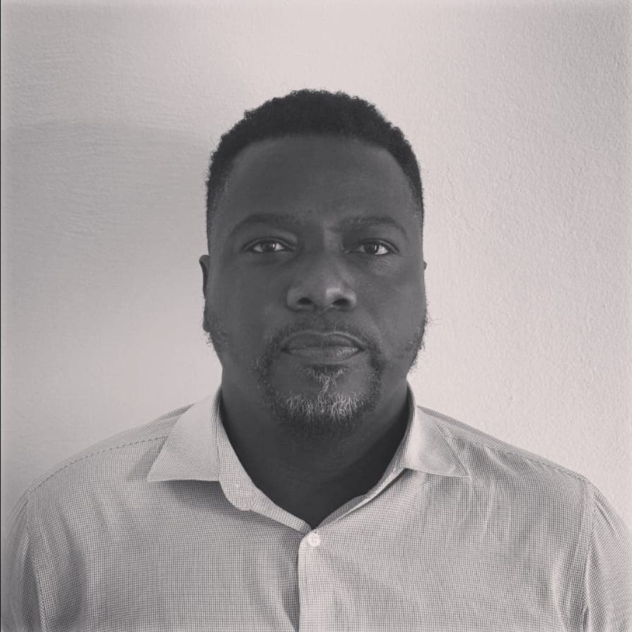 Portrait of Lamin Kakay, Group Executive Director at Rhodium Services Group